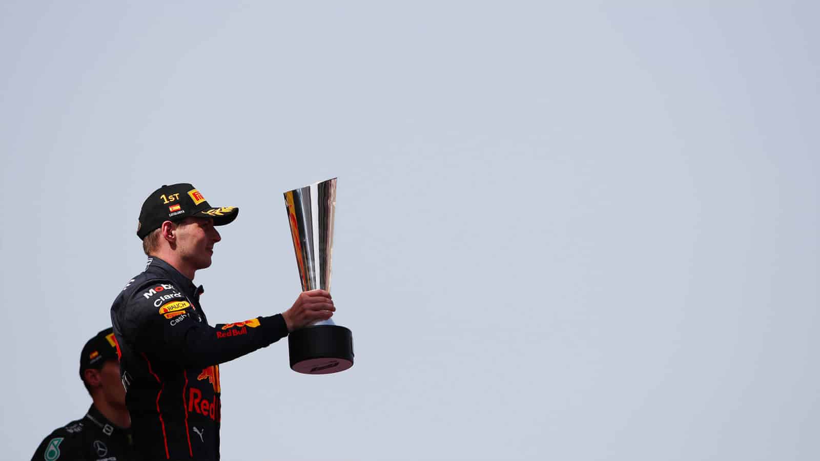 Max-Verstappen-with-the-winning-trophy-on-the-podium-at-the-2022-Spanish-Grand-Prix