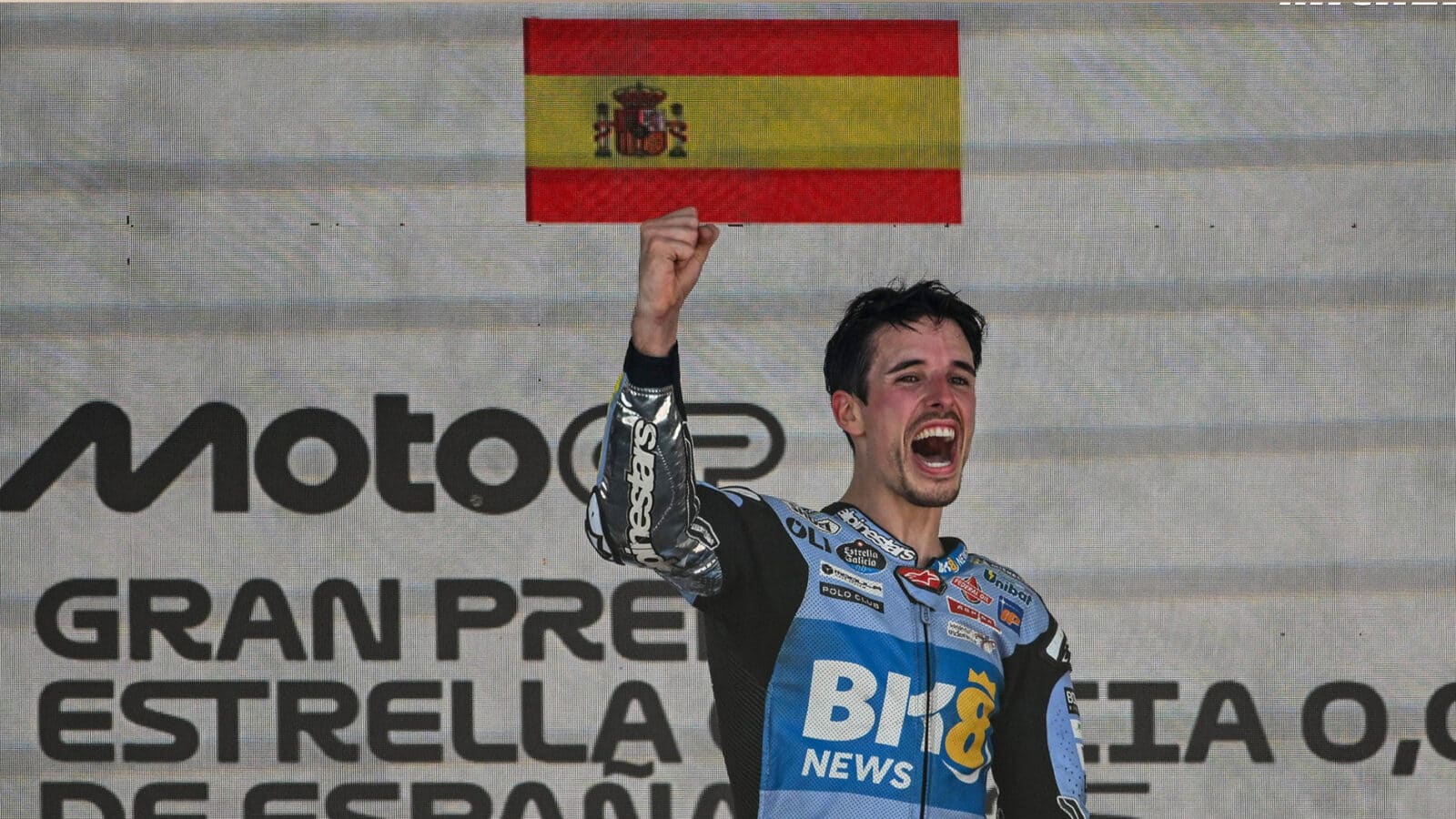 Alex Marquez on the podium at the 2025 Spanish Grand prix after winning his first MotoGP race