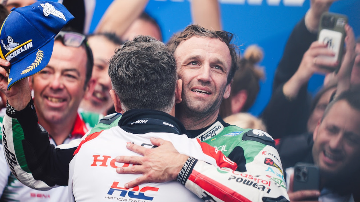 Johann Zarco embraces LCR owner Lucio Cecchinello after winning 2025 MotoGP French GP