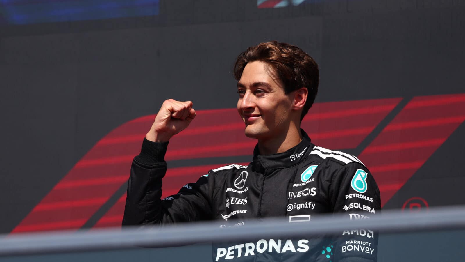 George Russell holds his fist up after winning the 2025 F1 Canadian Grand Prix