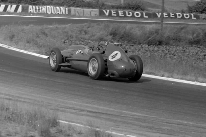 Mike Hawthorn driving his Ferrari 246.