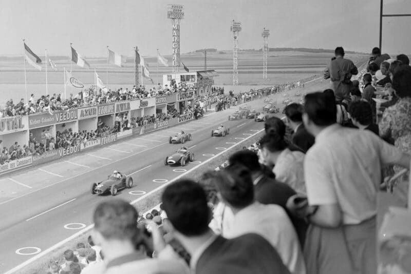 Harry Schell (BRM P25), Tony Brooks (Vanwall) Mike Hawthorn (Ferrari 246) and Luigi Musso, (Ferrari 246) at the start of the race.