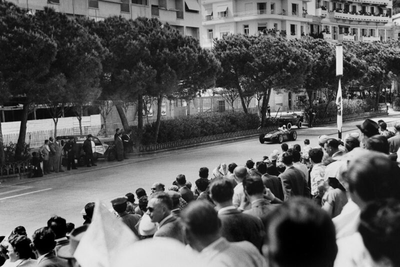 Moss races past the spectators