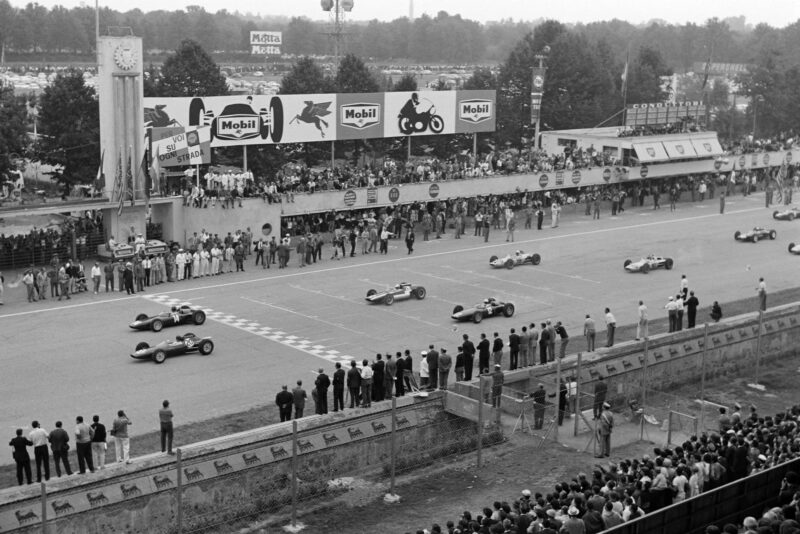 Clark and Hill lead the field away at the race start