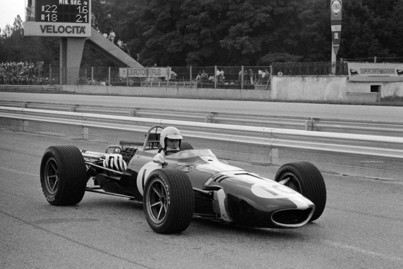 Ludovico Scarfiotti, Eagle T1G Weslake, passes through the pit lane.