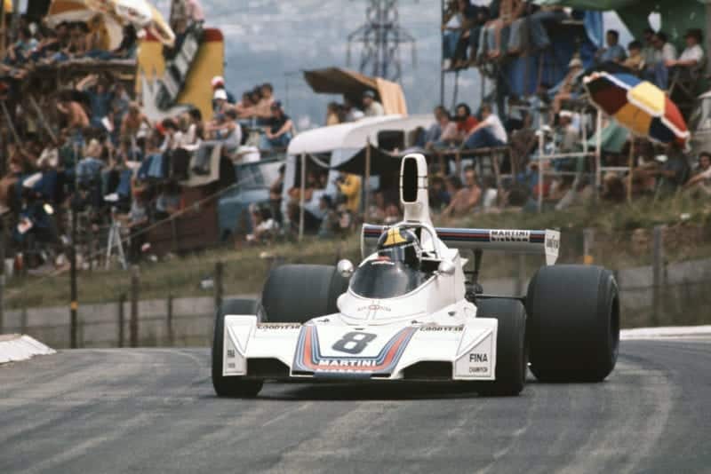 Carlos Pace oversteers his Brabham at the 1975 South African Grand Prix, Kyalami.