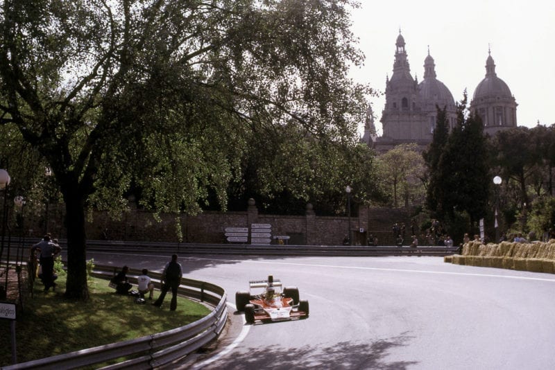 Jochen Mass (McLaren) rounds a bend at the 1975 Spanish Grand Prix, Montjuïc Park.