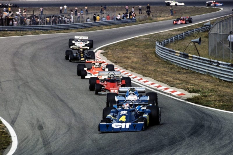 Tyrell's Patrick Depailler leads a train of cars, 1976 Dutc Grand Prix, Zandvoort.