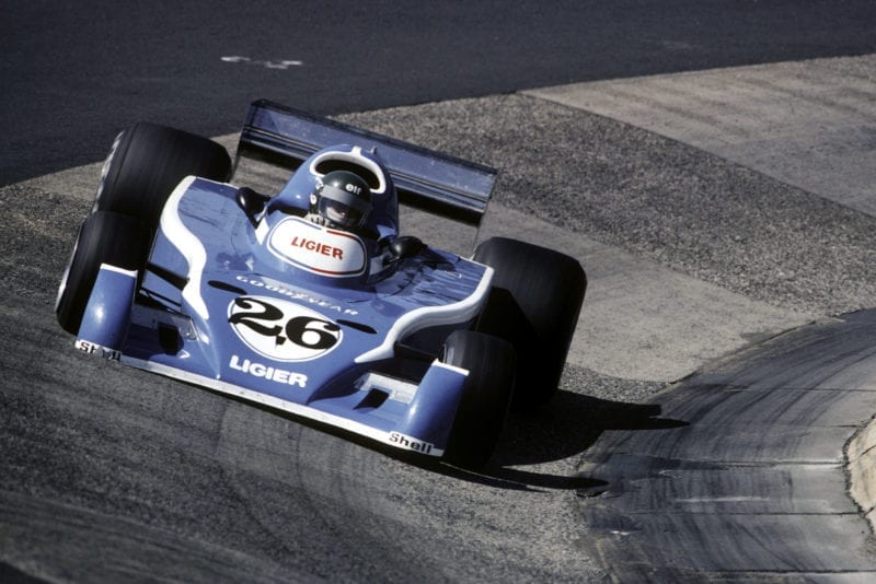 Jacques Laffite (Ligier) round sthe Karussell at the 1976 German Grand Prix, Nürburgring.