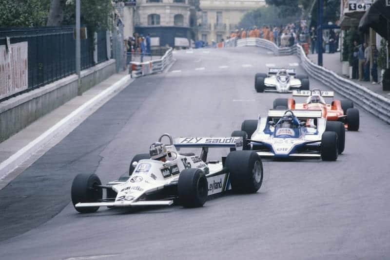 Carlos Reutemann (Williams FW07B Ford) leads Jacques Lafitte (Ligier JS11/15 Ford), Patrick Depailler (Alfa Romeo 179) and Nelson Piquet (Brabham BT49 Ford) into Mirabeau.