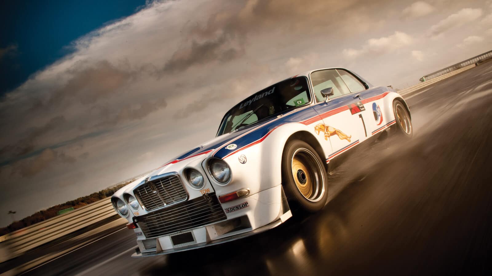 Broadspeed Jaguar XJC splashes through water at Silverstone
