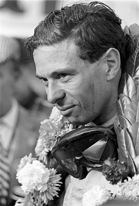 Jim Clark wears winners garland after victory in the 1963 F1 Belgian Grand Prix
