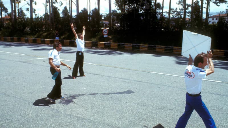 The Ligier-Ford team celebrate the 1-2 win of Jacques Laffite and Patrick Depailler in the 1979 Brazilian Grand Prix at Interlagos. Centre is technical director Gerard Ducarouge. Photo: Grand Prix Photo