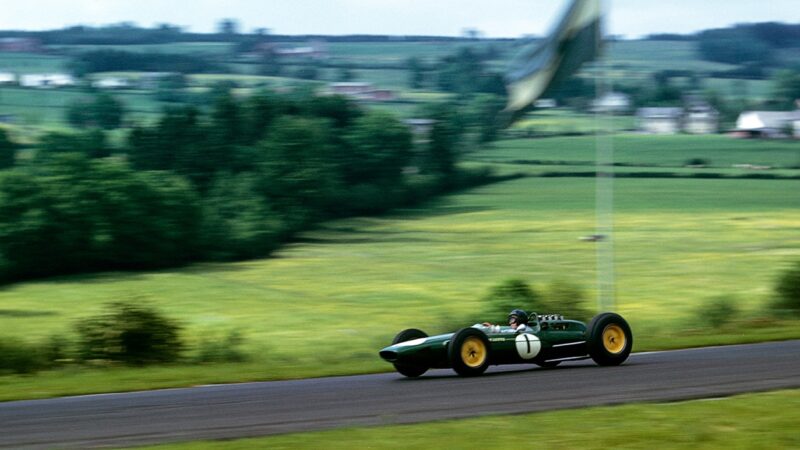 Lotus of Jim Clark speeds past photographer in 1963 F1 Belgian Grand Prix