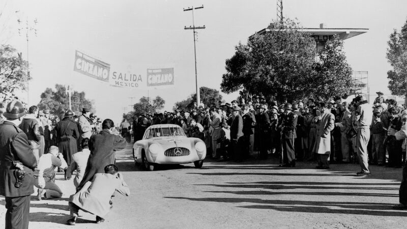 Mercedes 300SL with bars across windscreen in Carrera Panamerica with drivers Karl Kling and Hans Klenk