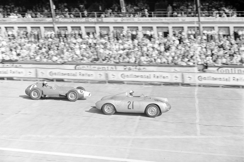 Edgar Barth, Porsche 550RS, leads Luigi Musso, Ferrari D50, during the 1957 German Grand Prix, Nurburgring.
