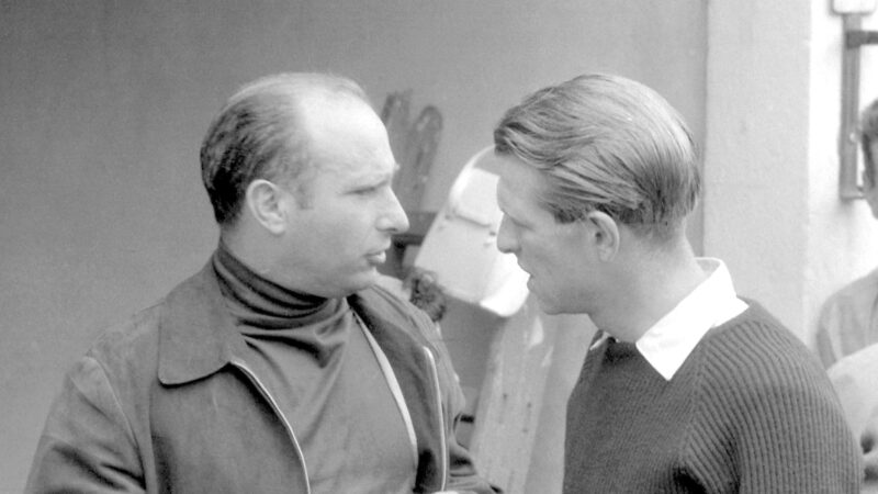 Peter Collins with Juan Manuel Fangio in 1956