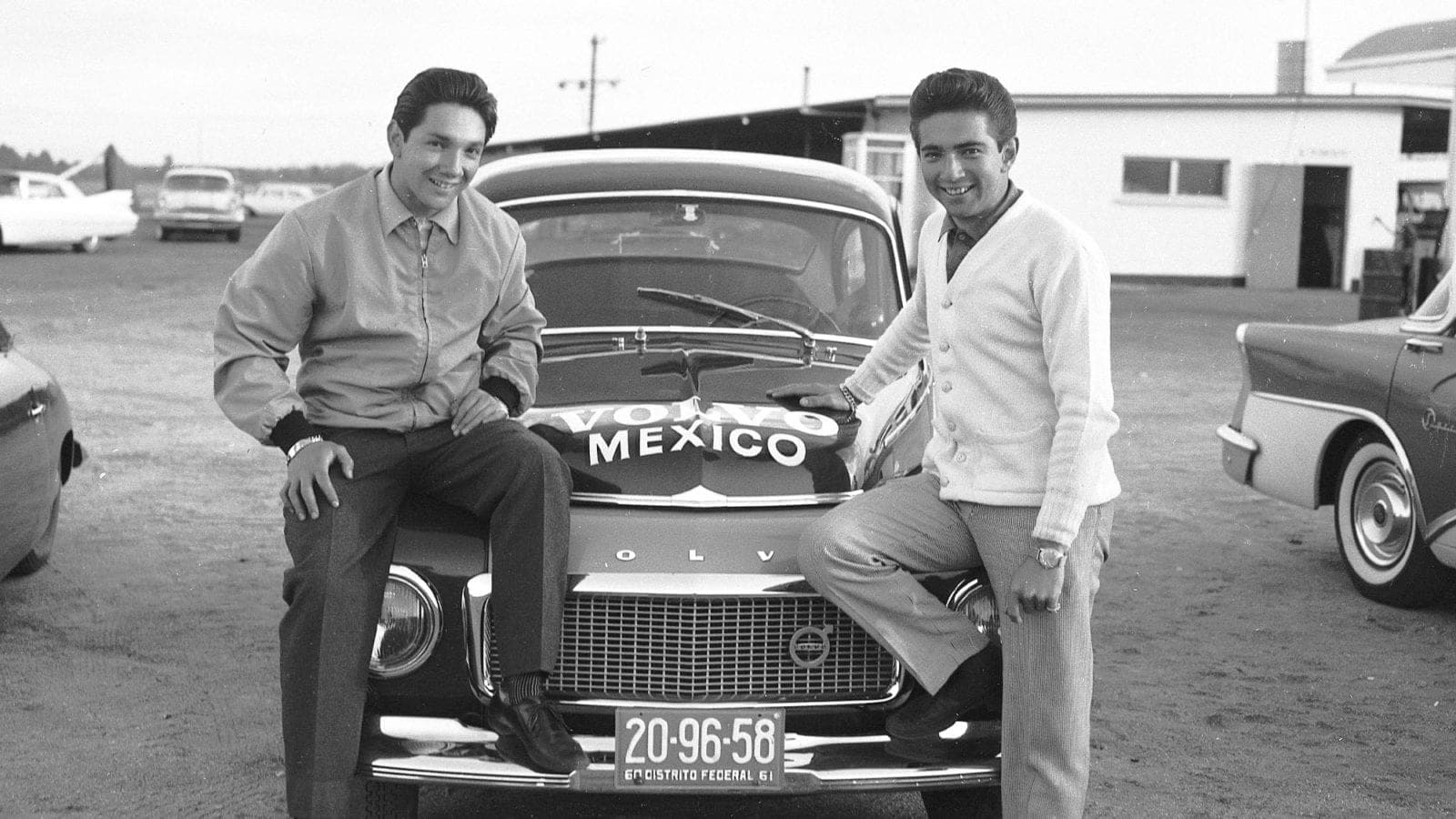 DAYTONA BEACH, FL - JANUARY 25, 1960: Brothers Pedro (L) and Ricardo Rodriguez (R) with the Volvo of Mexico entry for the twin Compact Car races that were held at Daytona International Speedway on January 31, 1960. Pedro actually drove the Volvo in the races, while Ricardo was behind the wheel of a Chevrolet Corvair. (Photo by ISC Images & Archives via Getty Images)