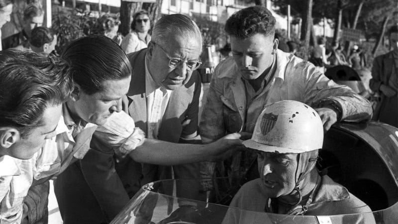 Harry Schell, Tony Vandervell, Vanwall VW 2, Grand Prix of Monaco, Circuit de Monaco, 13 May 1956. Vanwall team owner Tony Vandervell (with glasses) overseeing the pit stop of Harry Schell driving one of his Vanwall cars. (Photo by Bernard Cahier/Getty Images)
