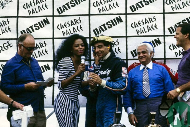 Tyrrell driver Michele Alboreto is congratulated by Diana Ross after winning the 1981 Las Vegas GP