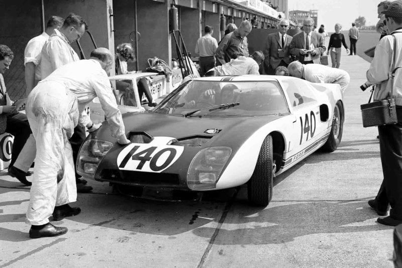 1964 Nurburgring 1000 Kms Nurburgring, Germany. 31st May 1964 The Ford GT40 (on its race debut) of Phil Hill and Bruce McLaren is worked on in the pits.
