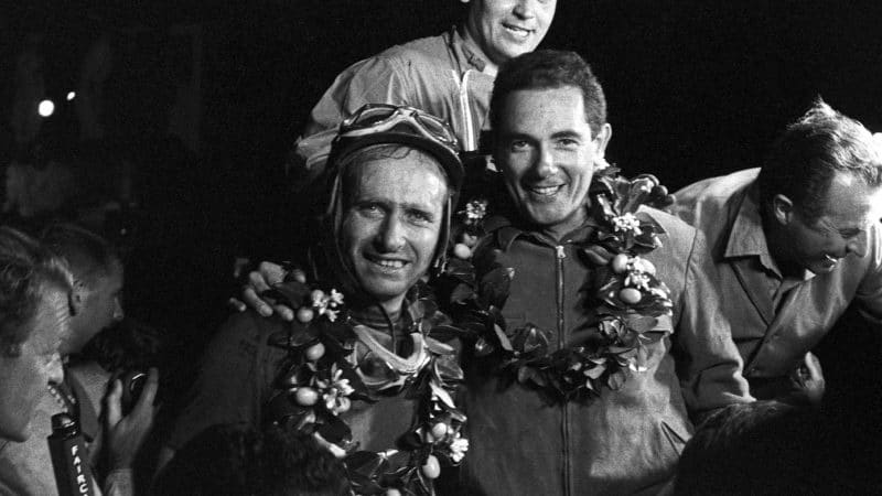 Juan Manuel Fangio and Jean Behra after winning 1957 12 Hours of Sebring