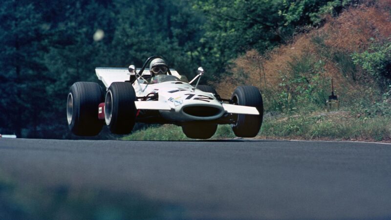 Vic Elford in mid air over a bump in the 1970 German GP at the Nurburgring