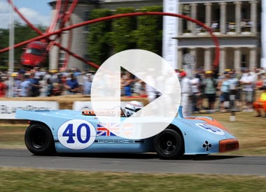 Driving a Porsche 908/3 up the hill at Goodwood