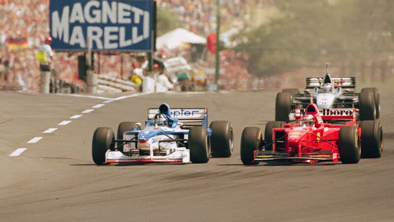 Damon Hill passes Michael Schumacher in 1997 F1 Hungarian Grand Prix