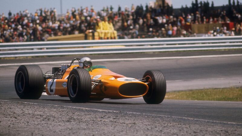 Bruce McLaren's McLaren-Ford, Spanish Grand Prix, Jarama, Madrid, 1968. McLaren retired with mechanical trouble after 77 laps of the race. New Zealander McLaren won 4 Grands Prix in a 13-season Formula 1 career, finishing second in the World Drivers' Championship in 1960. In 1966 he set up his own team bearing his name which went on to become one of the most successful constructors in the history of the sport. Unfortunately Bruce McLaren did not live to see the success of the organisation, as he was killed at Goodwood in 1970 while testing the McLaren M8D-Chevrolet Can-Am sports car. (Photo by National Motor Museum/Heritage Images/Getty Images)