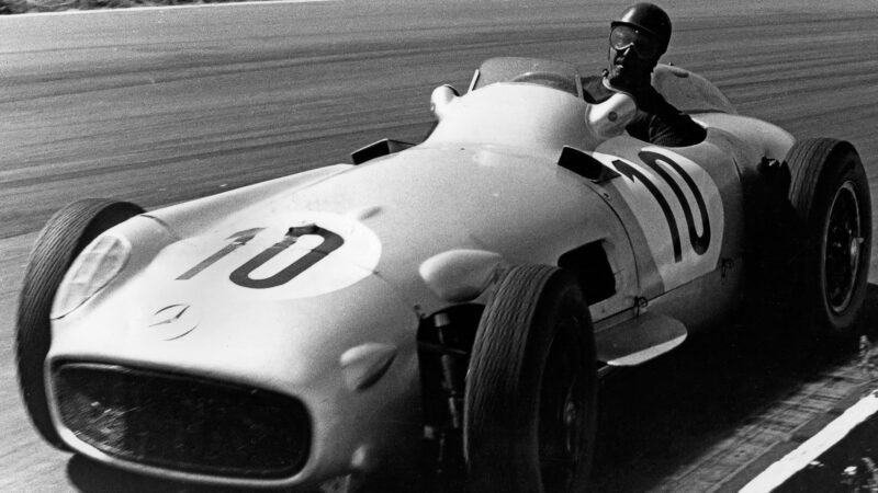 Juan Manuel Fangio cornering during the 1955 British Grand Prix at Aintree