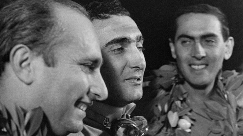 Juan Manuel Fangio with Eugenio Castellotti and Luigi Musso