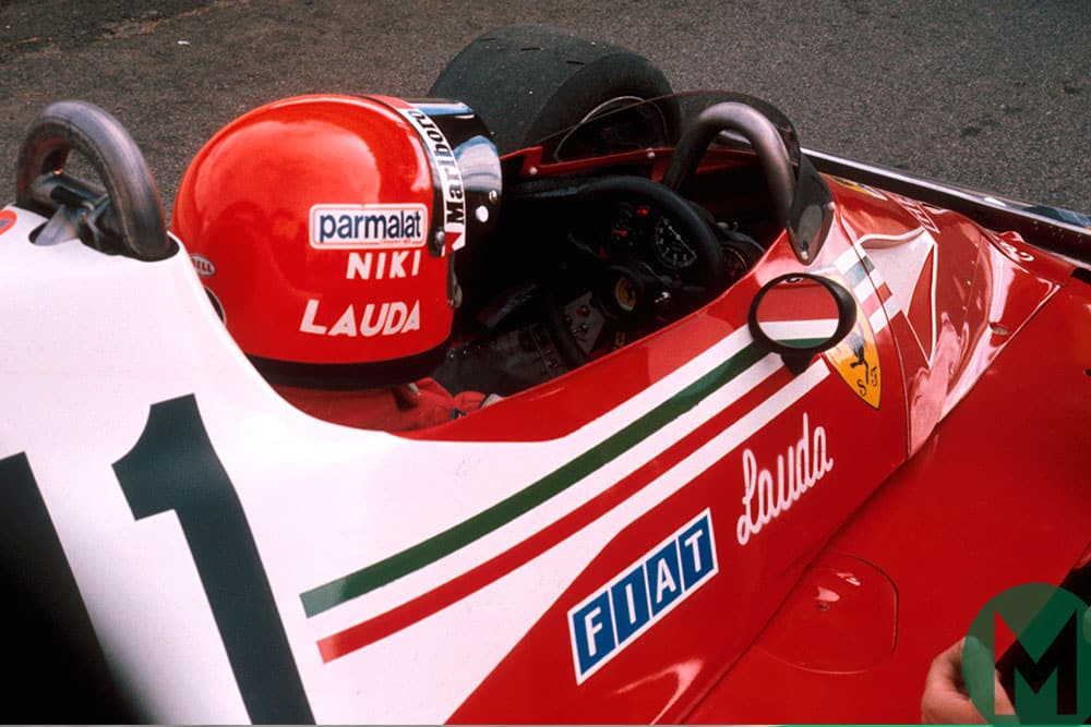 Niki Lauda prepares for the 1977 South African GP in his Ferrari