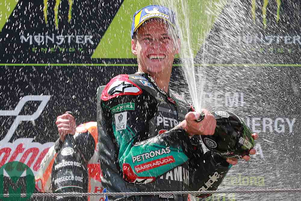 Fabio Quartararo celebrates on the podium