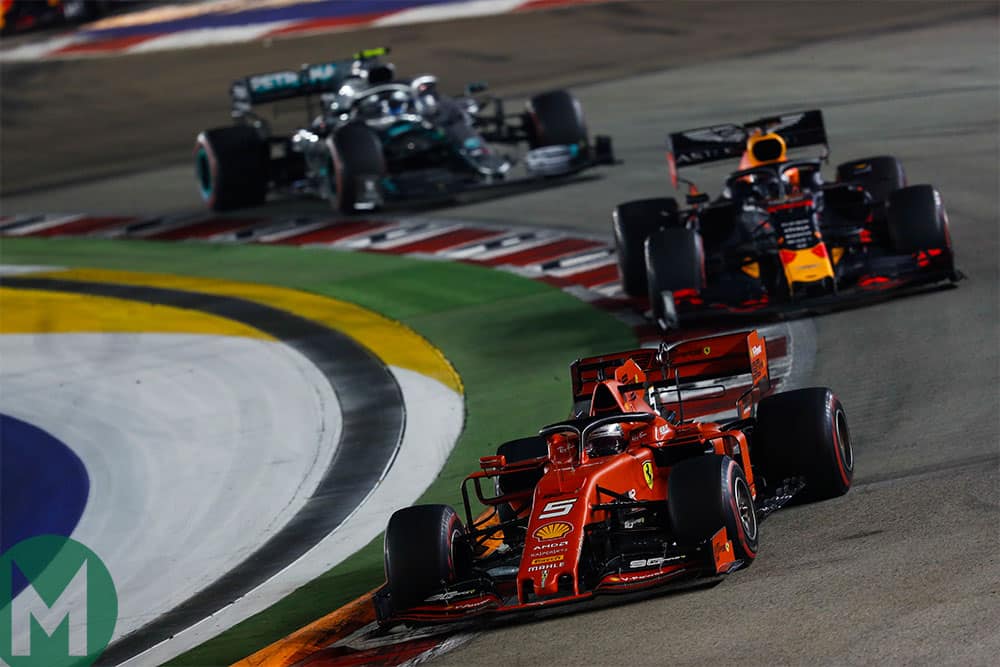 Sebastian Vettel ahead of Max Verstappen and Valtteri Bottas at the 2019 Singapore Grand Prix