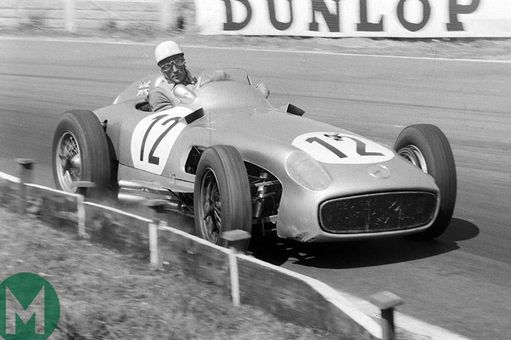 Stirling Moss in a Mercedes W196 during the 1955 British Grand Prix at Aintree