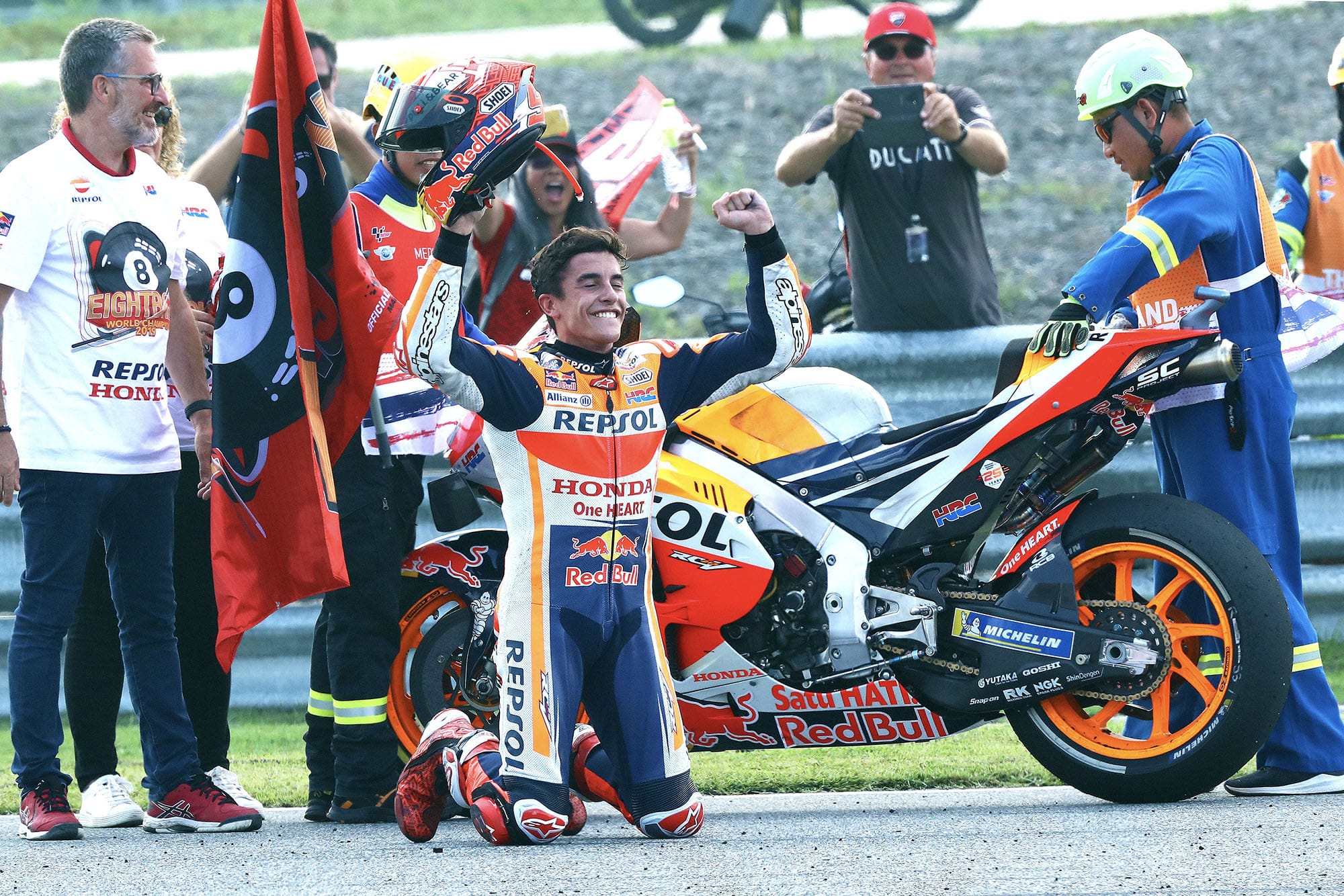 Marc Marquez on his knees after winning his sixth MotoGP championship at the 2019 Thailand Grand Prix