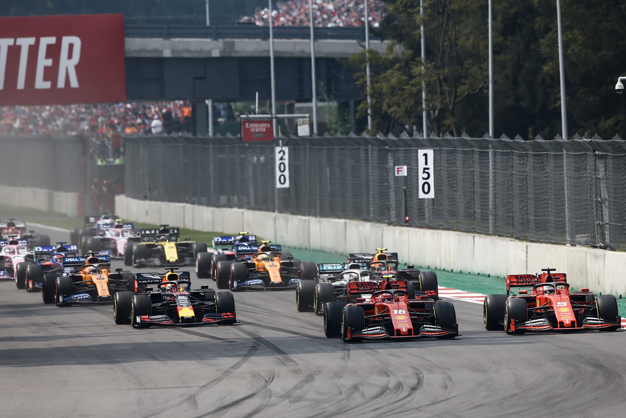 Vettel and Leclerc lead the grid away at the start of the 2019 F1 Mexican Grand Prix 