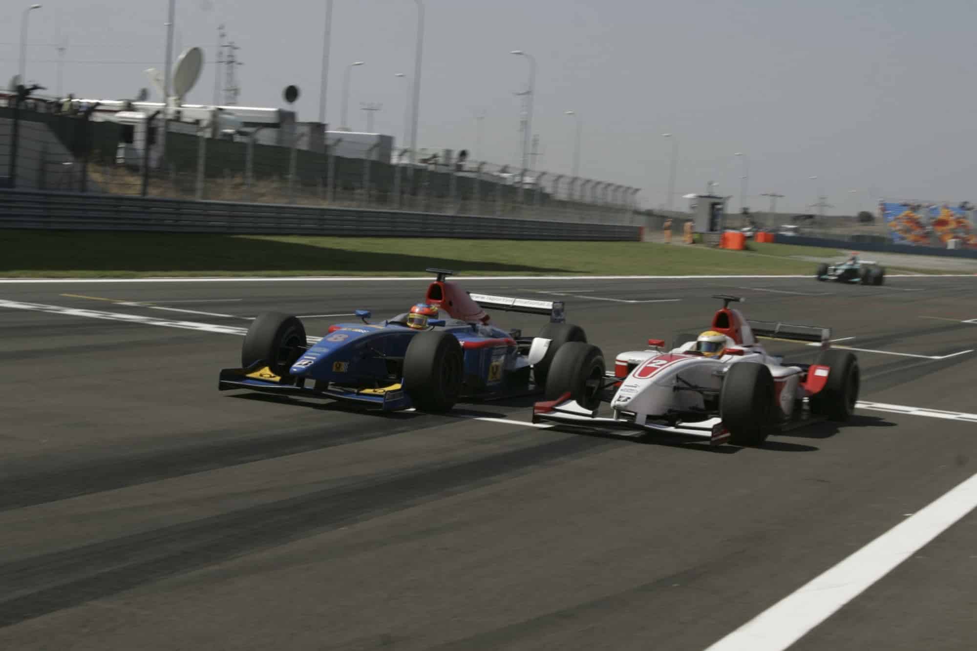 Lewis Hamilton and Timo Glock battle side by side at the 2006 GP2 race in Istanbul