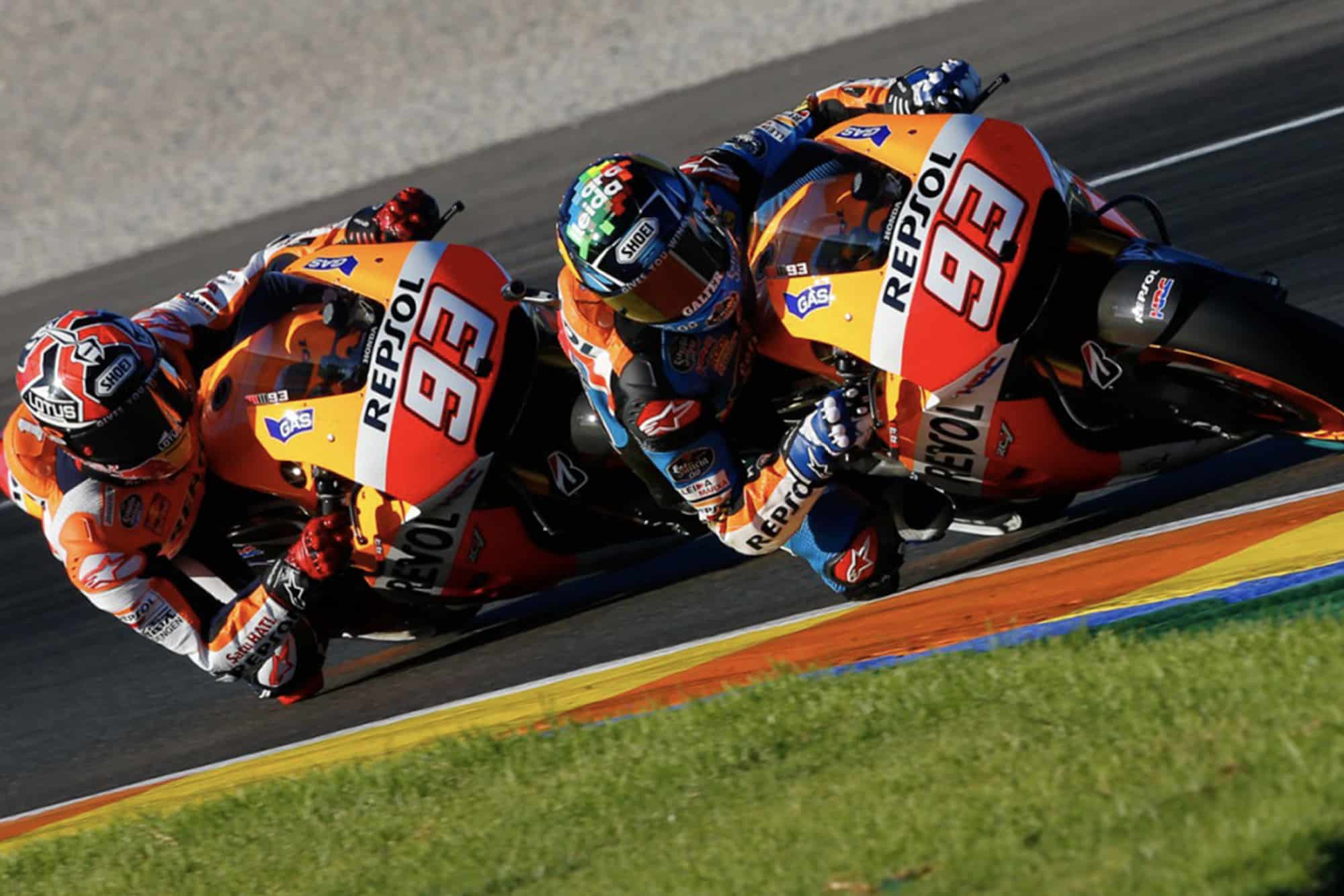 Alex Marquez and Marc Marquez ride the MotoGP Honda RC213V in 2014