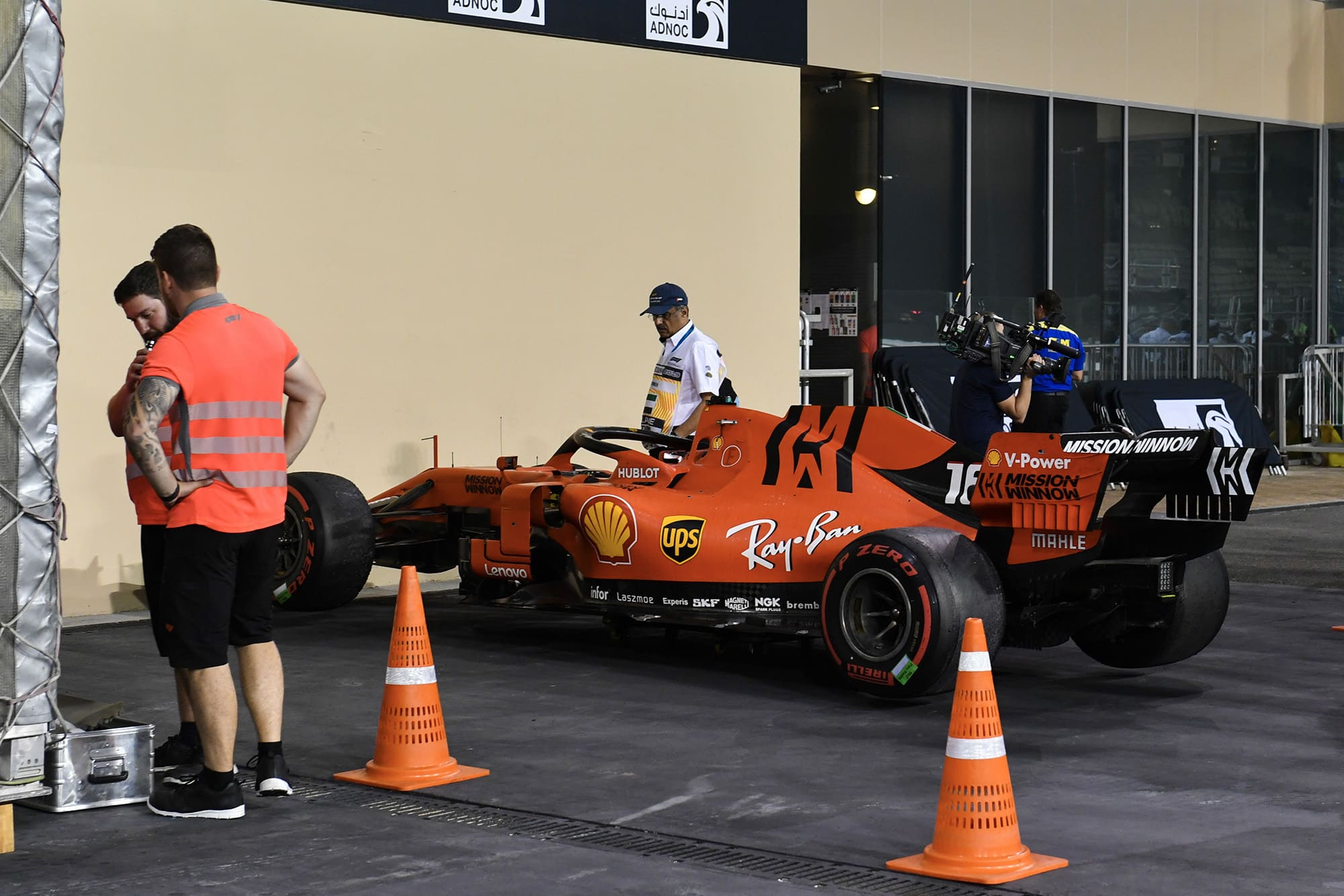 Charles Leclerc's ferrari is isolated after the 2019 Abu Dhabi Grand Prix as it is investigated over fuel irregularities