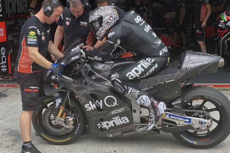 Aleix Esparagaro in the pits on his Aprilia in 2020 Sepang MotoGp testing