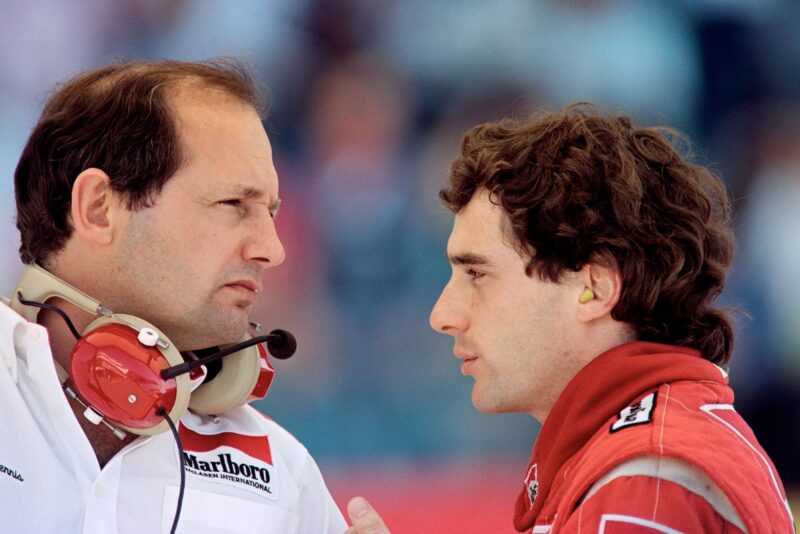 Ayrton Senna talks to Ron Dennis after retiring from the 1989 Portuguese Grand Prix