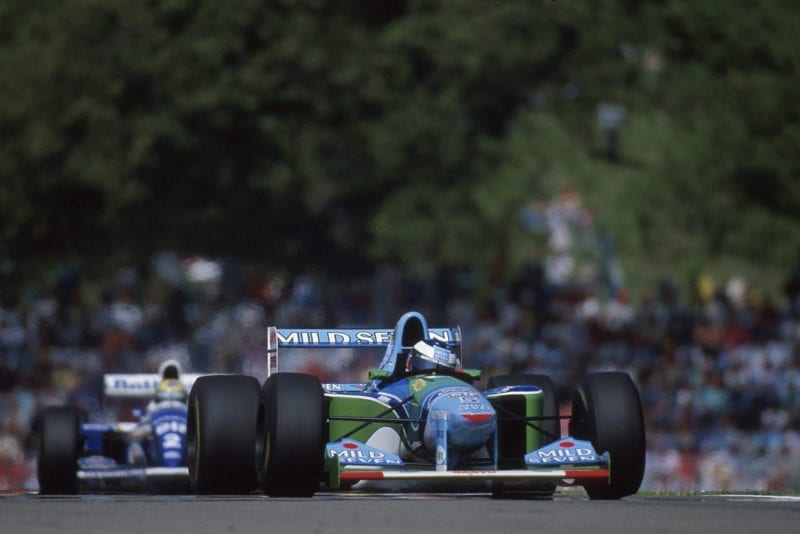 Ayrton Senna follows Michael Schumacher in the 1994 San Marino Grand Prix