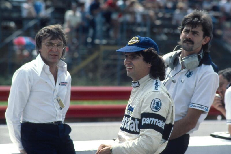 Nelson Piquet with Bernie Ecclestone and Gordon Murray in 1983