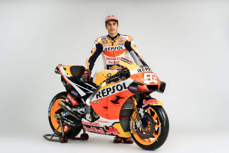 Marc Márquez alongside the 2020 Honda