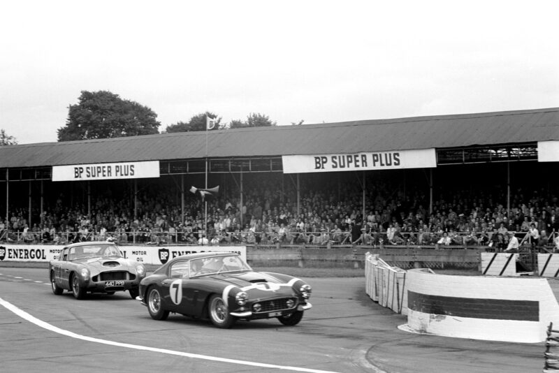 Stirling Moss on his way to his 1960 Tourist Trophy win at Goodwood in a Ferrari 250GT SWB