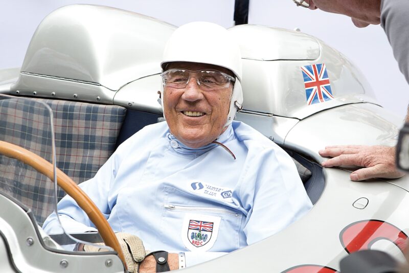 Stirling Moss in the 1955 Mille Miglia winning Mercedes 300 SLR at Goodwood in 2015