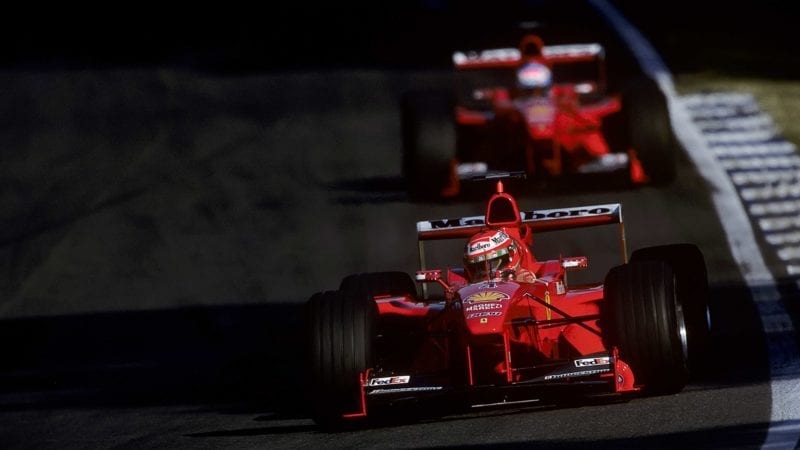 Eddie Irvine leads Mika Salo in the 1999 F1 German Grand Prix at Hockenheim