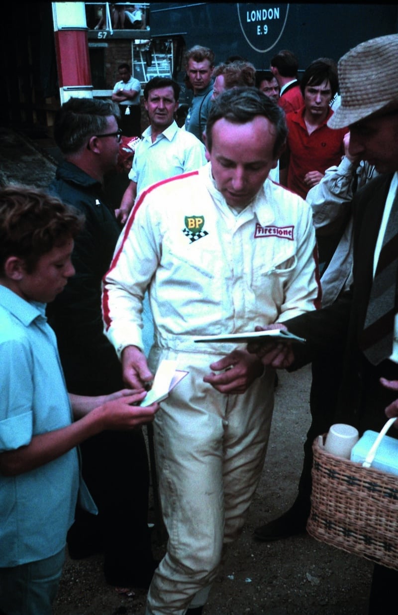 John Surtees signing autographs at the Brands Hatch Race of Champions